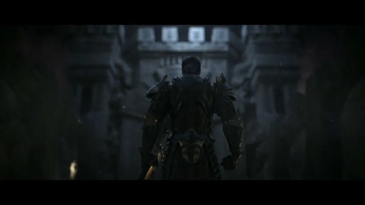 An armoured Ferelden stands before a castle in Dragon Age: Origins.