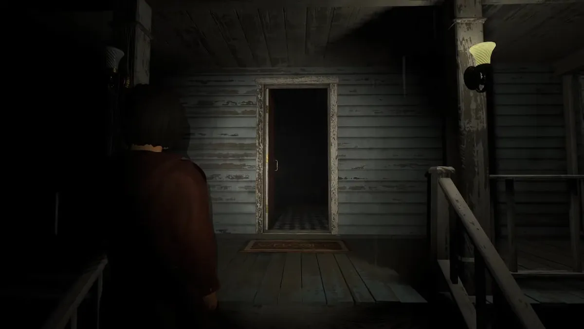 Girl waits outside a house in Devour.