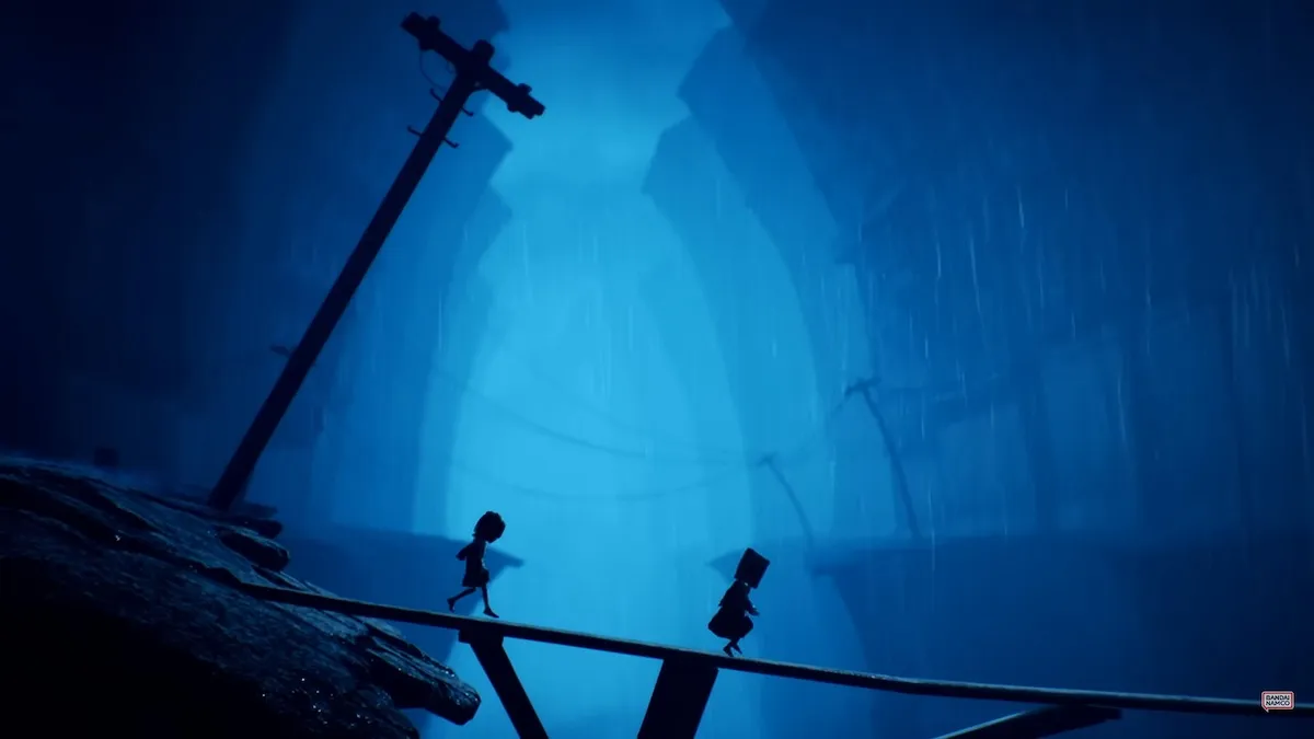 Mono and Six walk over a bridge together in Little Nightmares II.