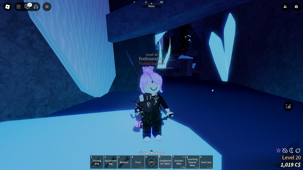 A pink-haired avatar holding a Smokescreen Totem in the Snowcap Cave in Fisch on Roblox.