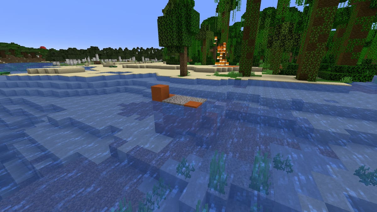 A set of Minecraft Trail Ruins next to a Beach with a lava pool and a Jungle biome on fire