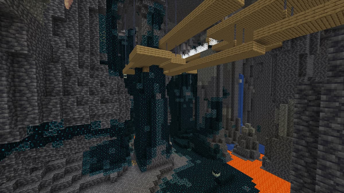 A Minecraft mineshaft in a Deep Dark biome with a lake of lava