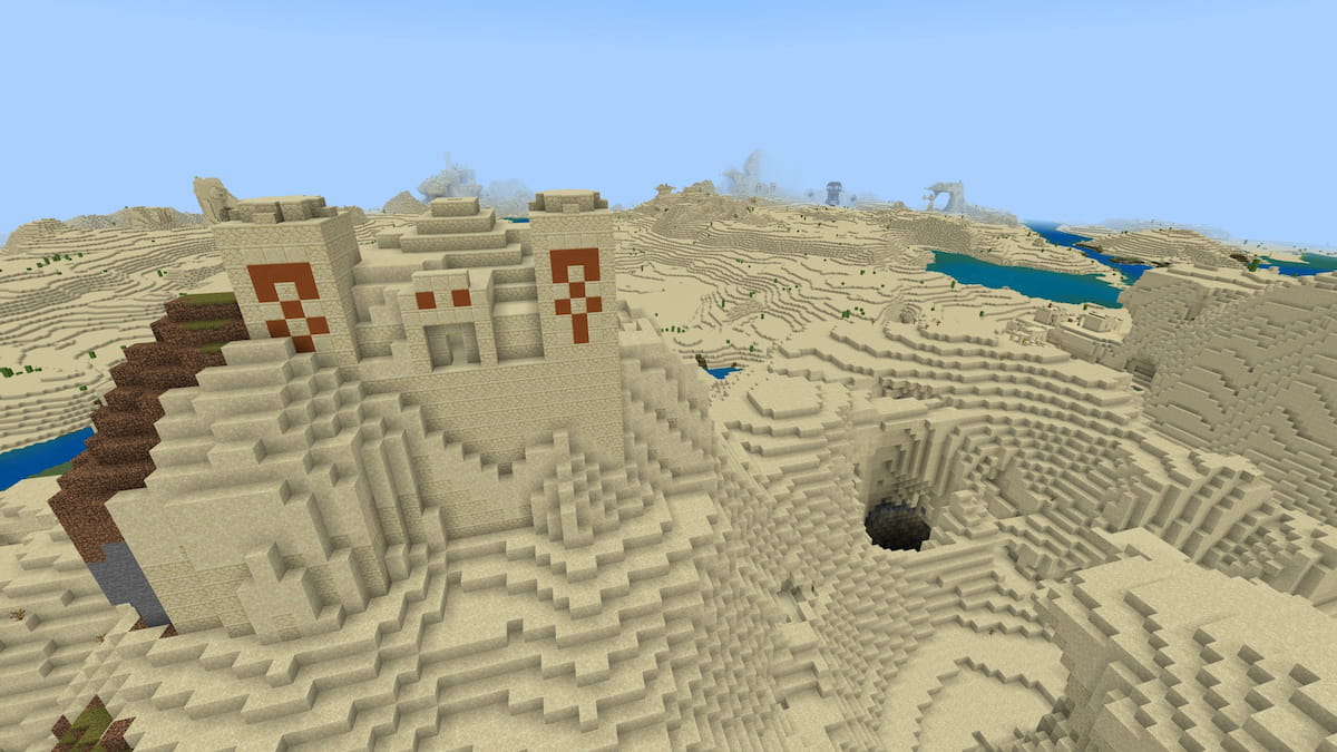 A tall Desert Temple by a Desert Village in Minecraft