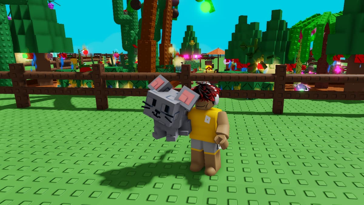 A player holding a mouse in Grow A Garden