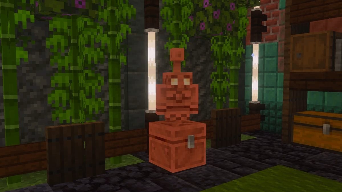 Minecraft Copper Golem standing on top of Copper Chest after crafting