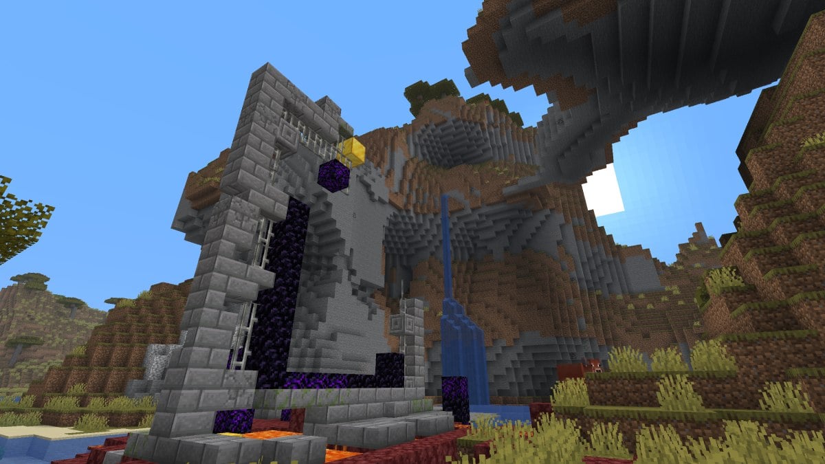 Minecraft nether portal hanging under unique cliff shape