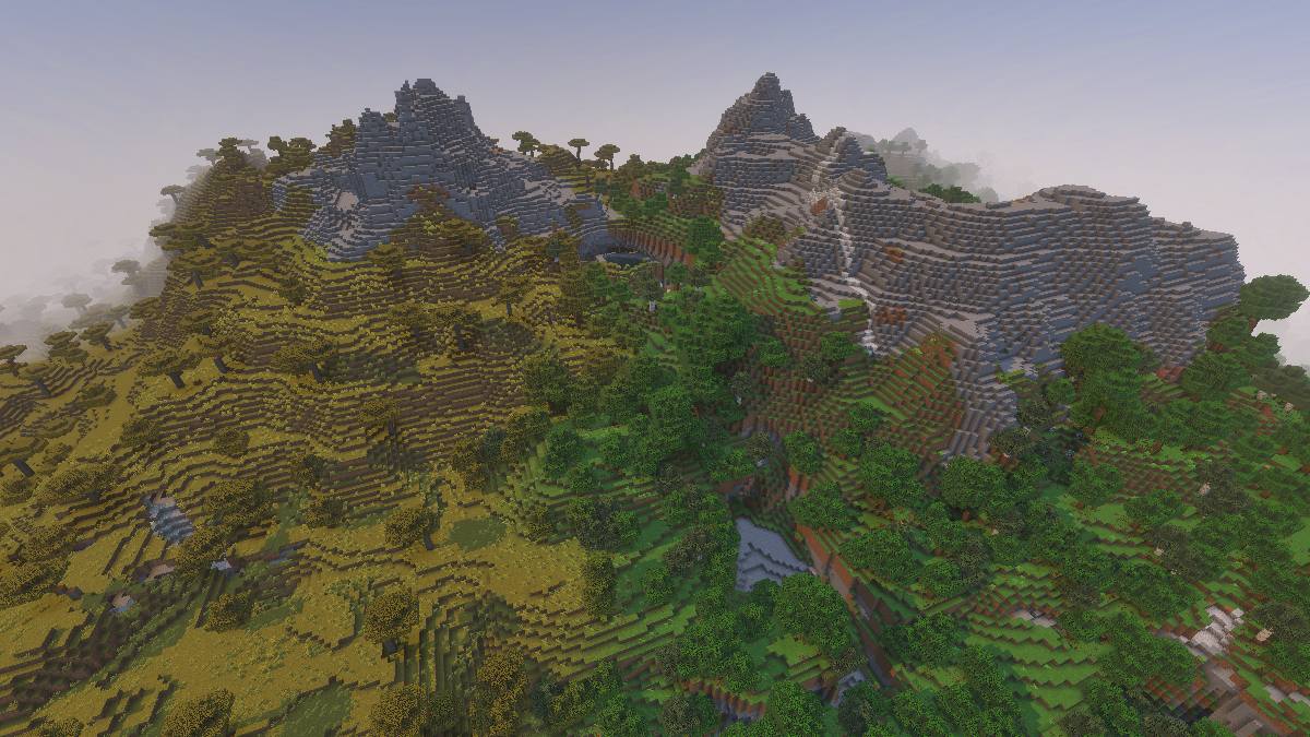 Minecraft stone peaks above taiga and spruce forests