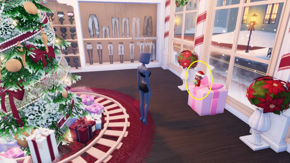 A Lana Doll on top of a Present