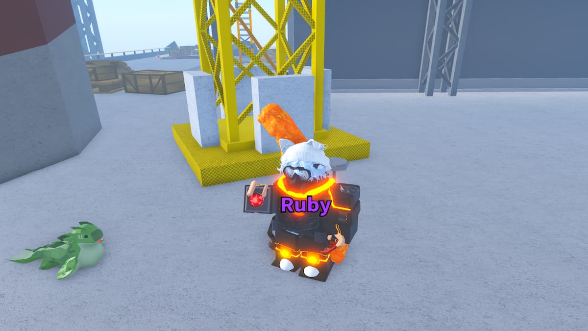 A player holding the Ruby Gemstone in Fisch