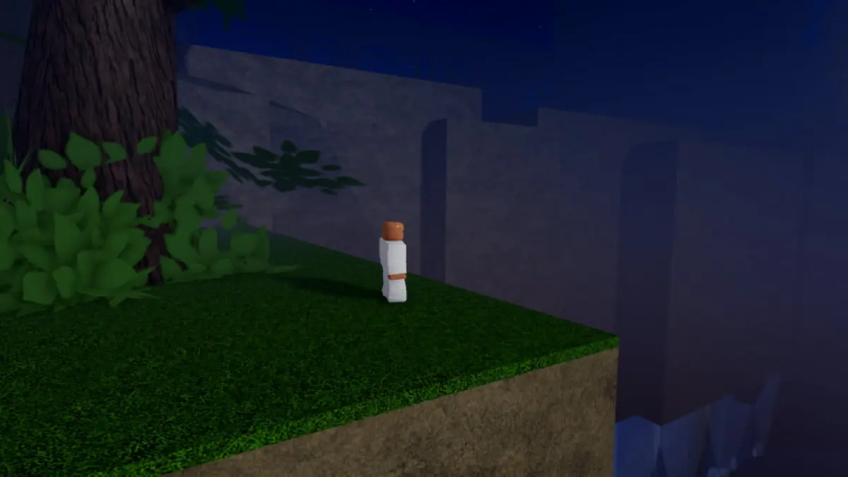 A player standin near the edge of a waterfall