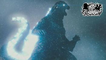 Kaiju Showdown game artwork showing a giant Godzilla-like monster roaring in a snowy scene, with the Kaiju Showdown logo in the top-right corner.
